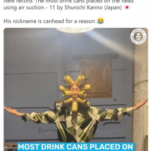 「空気吸引で缶を頭につけた最多数」で日本人男性が11本のギネス世界記録を樹立